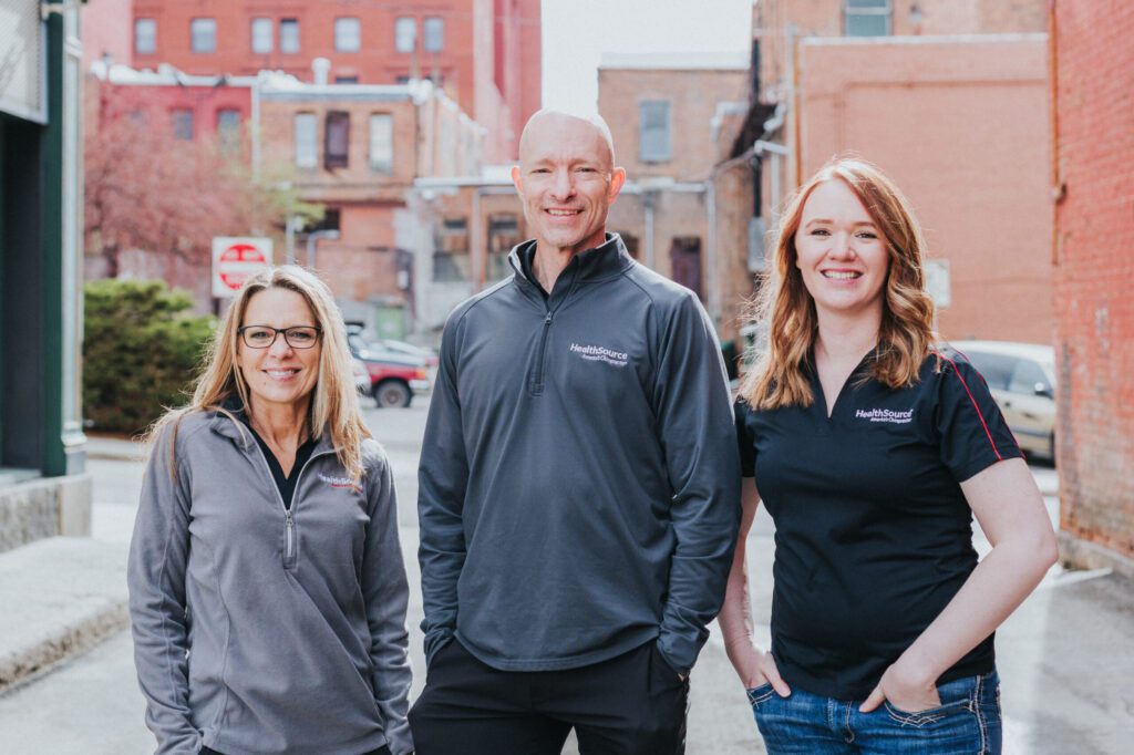 A group of franchisees posing together for a photo, showcasing the community and network within the franchise.