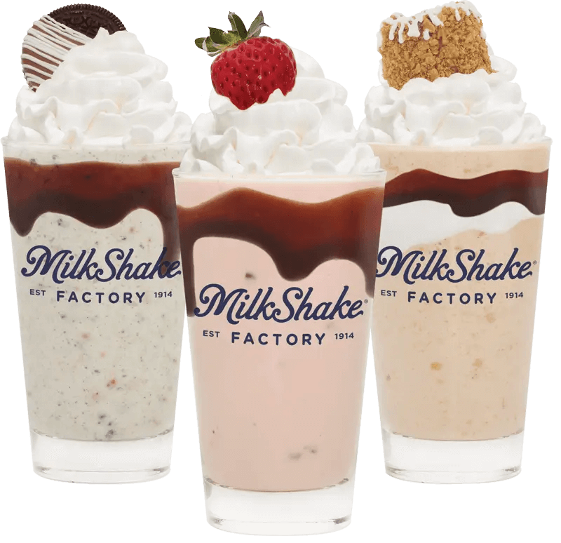 Three delicious milkshakes from a dessert franchise, showcasing a variety of flavors and toppings.